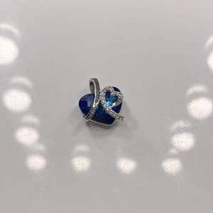 Kay jewelers necklace, “I love you forever” engraved in the band.